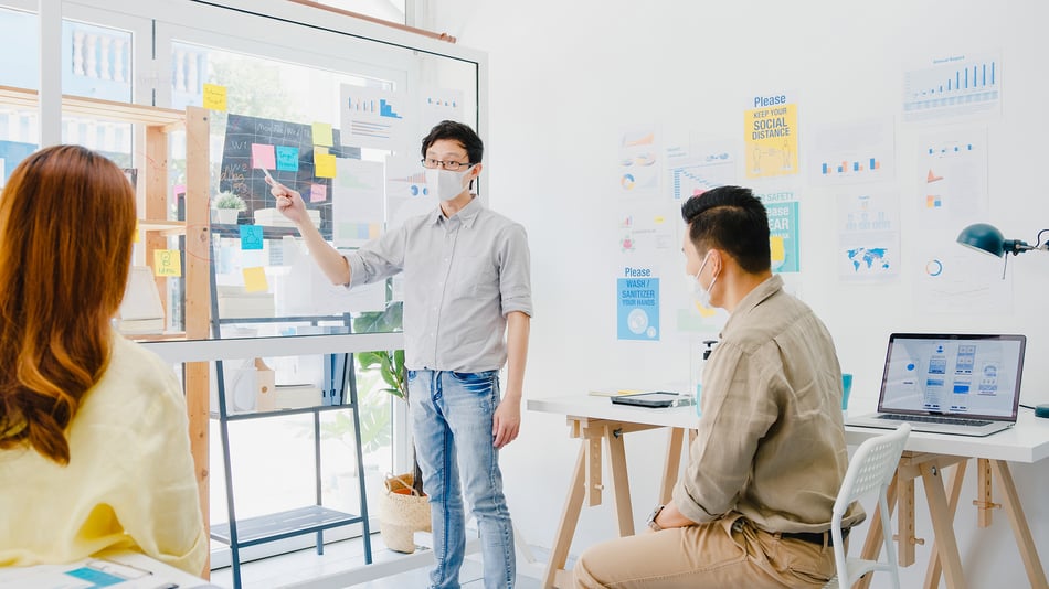 asia-businesspeople-meeting-brainstorming-ideas-conducting-business-presentation-ideas-project-colleagues-wear-protective-face-mask-back-new-normal-office-lifestyle-work-after-coronavirus